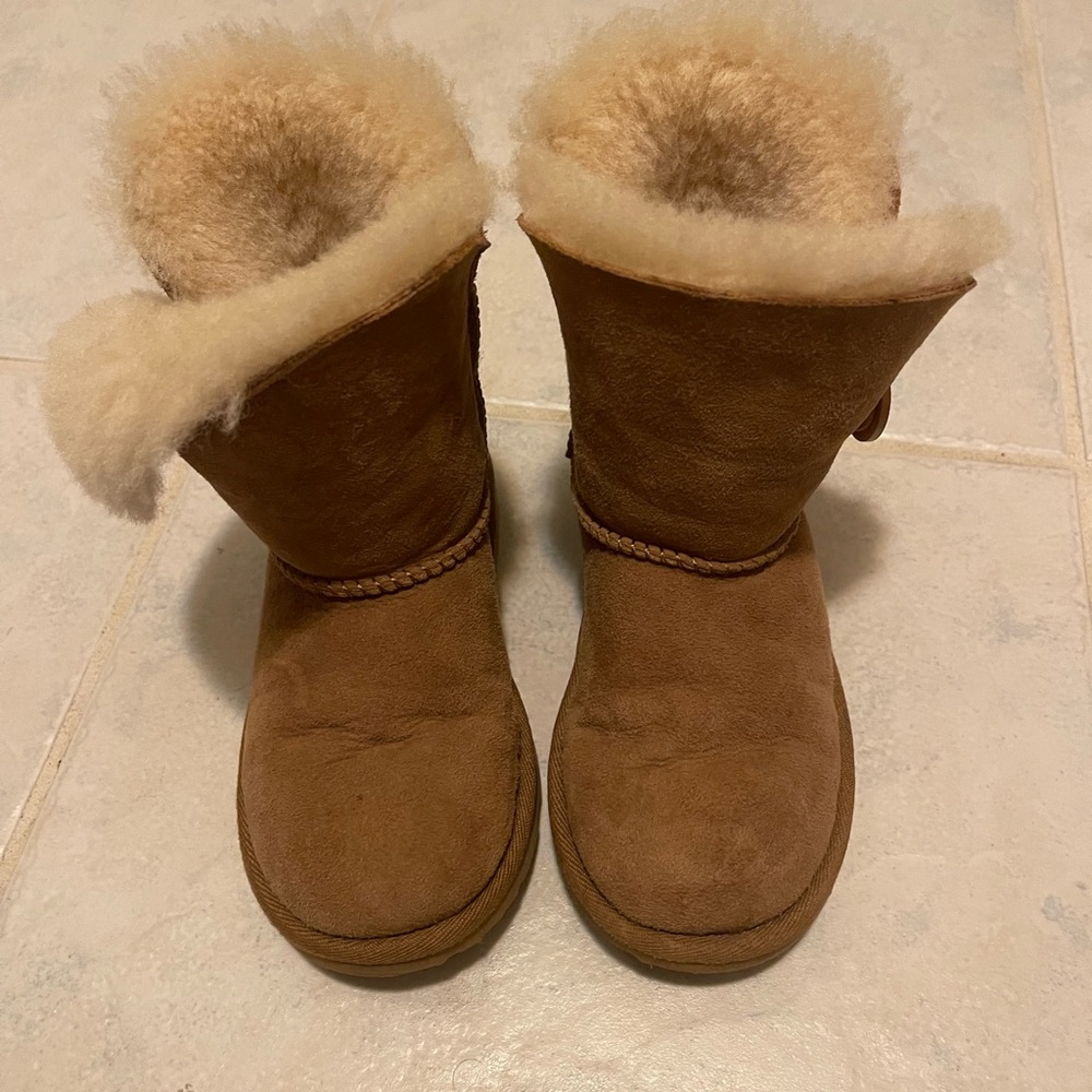 UGG BAILEY BUTTON BOOT. TODDLER SIZE 11. Worn some, but good condition.